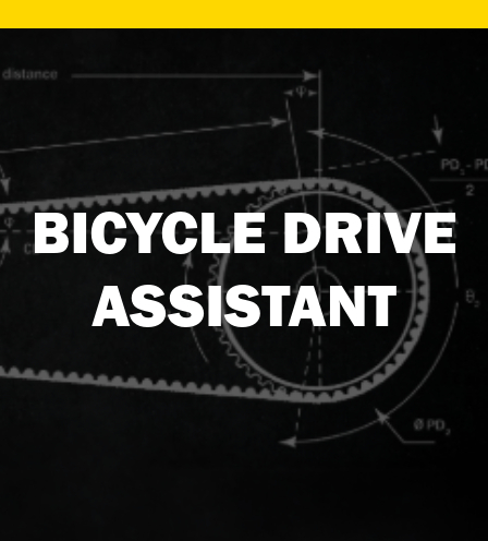  Blurry belt drive highlighted on a black background, labeled “Bicycle Drive Assistant.”