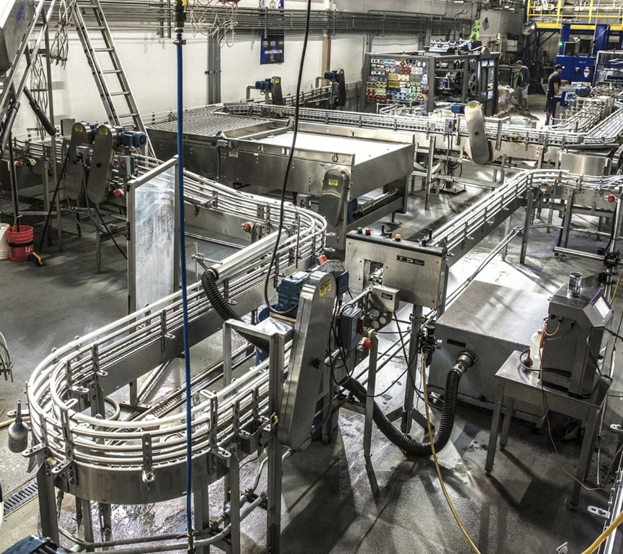 Automated manufacturing line with conveyor systems powered by Gates PowerGrip GT4 belts.