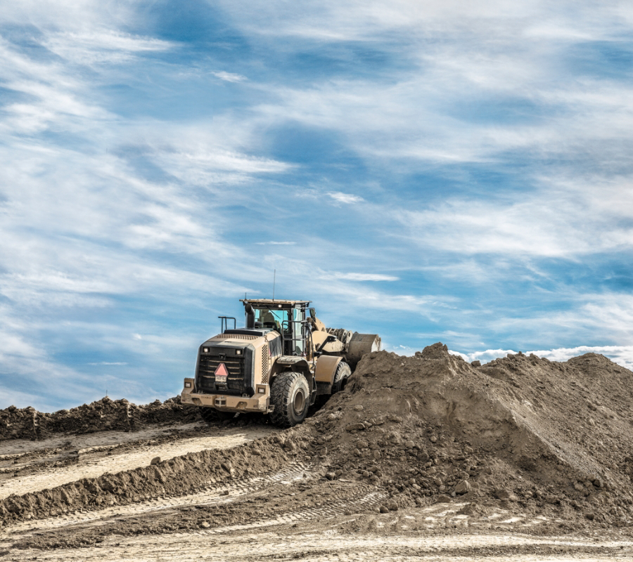 Bulldozer moving dirt at a construction site