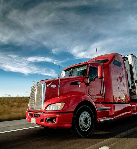 Red semi trailer sleeper truck