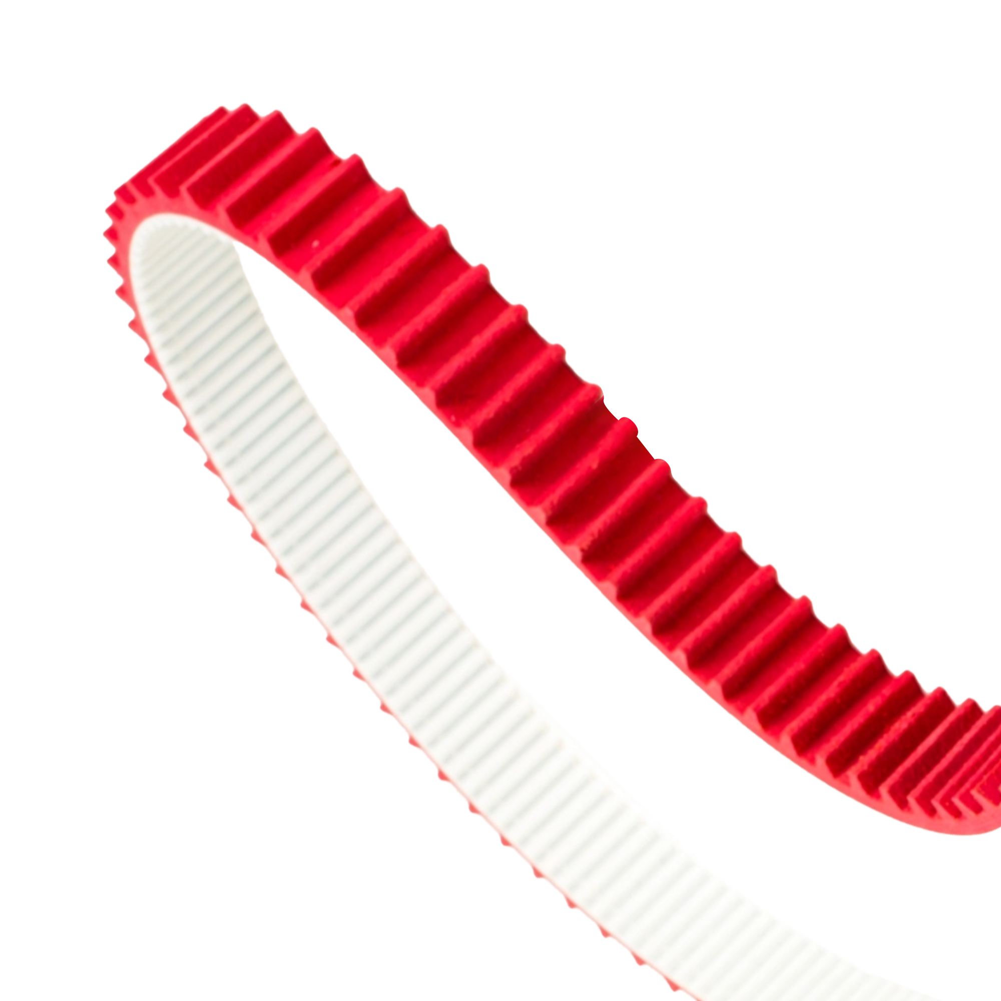 Close-up look of a Gates red and white toothed timing belt.